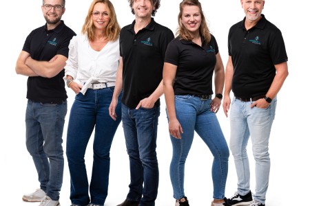 Ons team in de nieuwe bedrijfskleding
